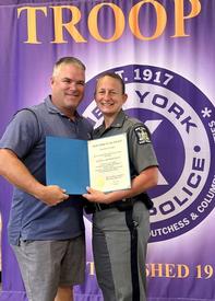 Congratulations to Trooper David E. Hendrickson, Troop K, on retiring after 20 years of dedicated service with the New York State Police. Trooper Hendrickson is pictured with Troop K Commander Major Kathryn Rohde.