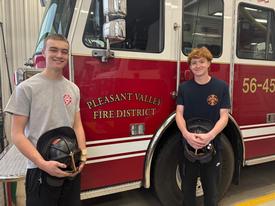 Daniel and Billy are all smiles after completing their probationary time with the Pleasant Valley Fire District. 